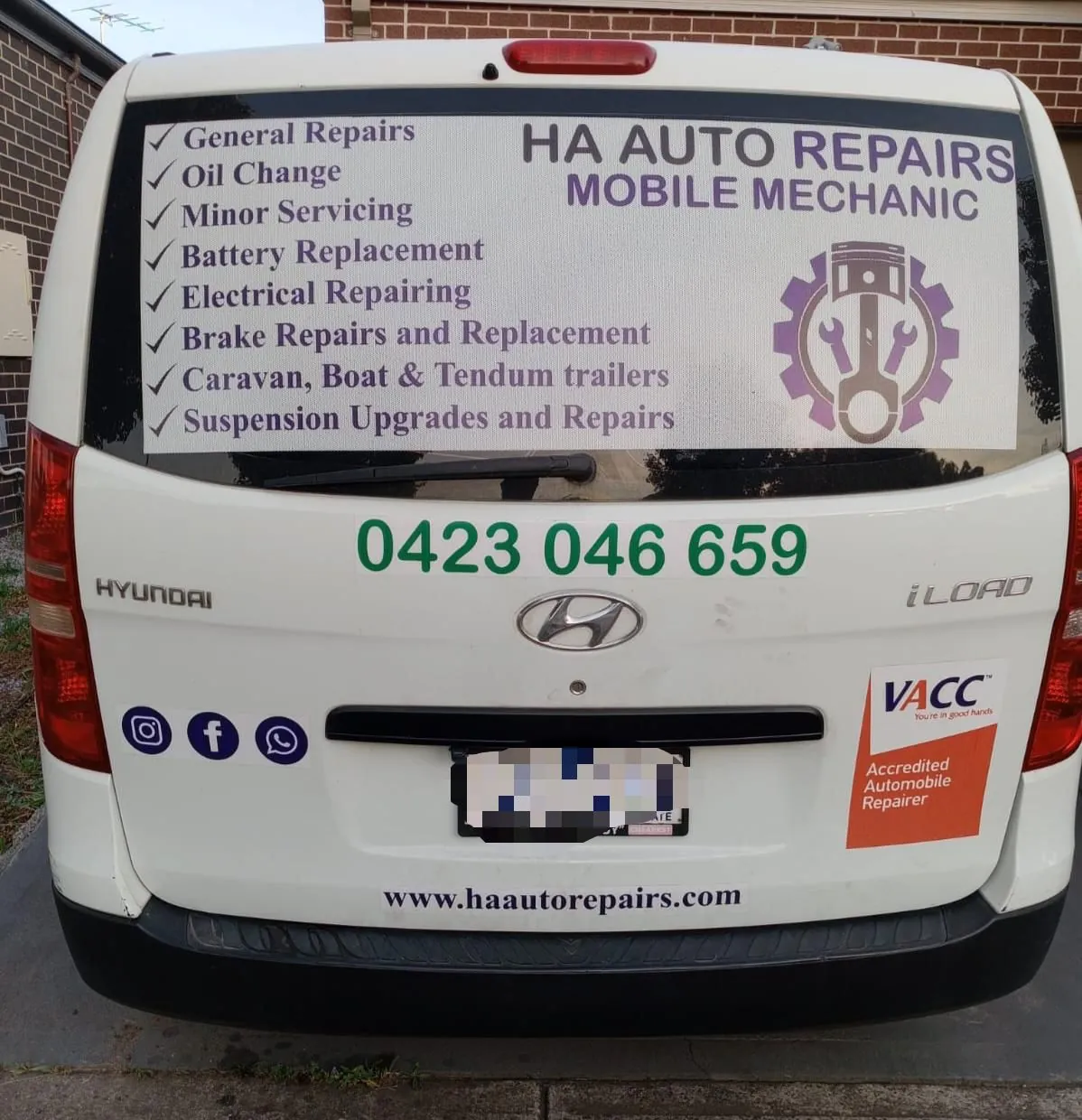 Car mechanic fixing car